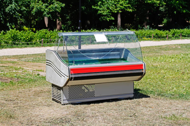 istock Empty refrigerator showcase standing on the grass in the park 1163704783