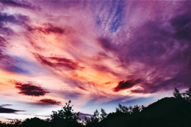 istock Strange colorful clouds floating in the sky at dusk 1163706972