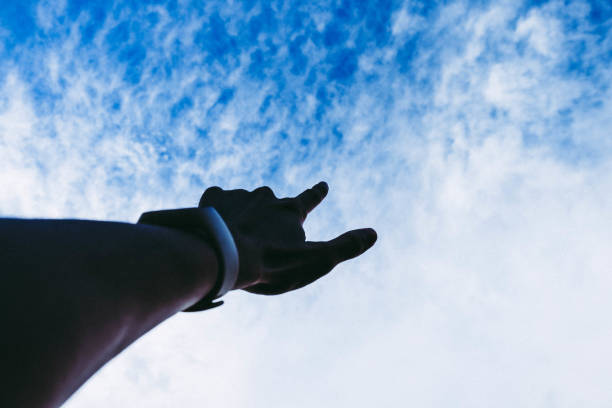 istock Fingers pointing to the sky 1163707107