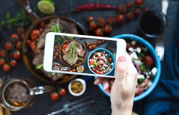 istock Taking photo for social media before eating 1163707412