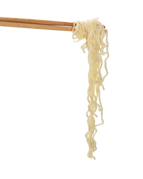 istock chopsticks noodles isolated 1163707506