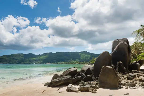 Photo of Big rocks on sandy Seychelles beach landscape