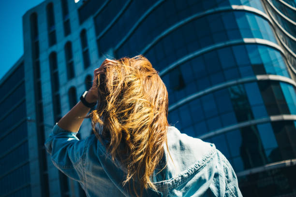 istock Young woman with long brown hair 1163708709