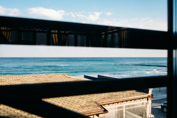 istock View through the window to blue sea 1163708718