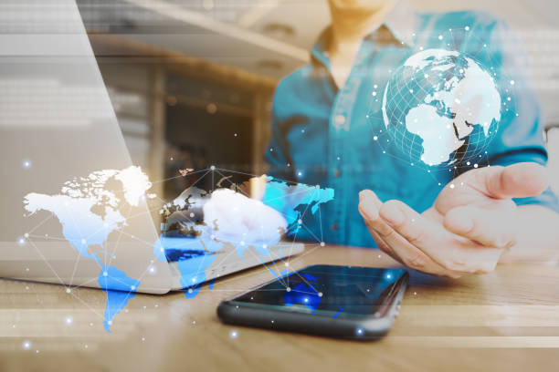 istock Globalization conceptual of technology use laptop and smartphone, wireless internet connection every where 1163712062