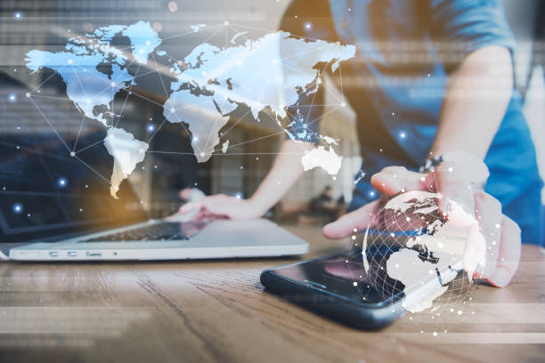 istock Globalization conceptual of technology use laptop and smartphone, wireless internet connection every where 1163712066