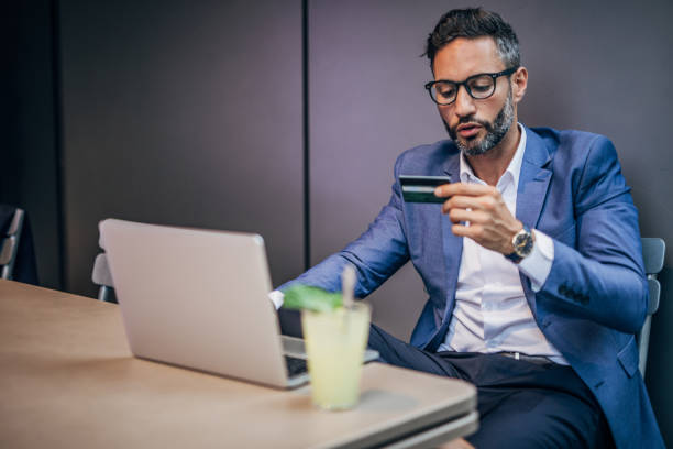 istock Modern gentleman in cafe outdoors 1163713369