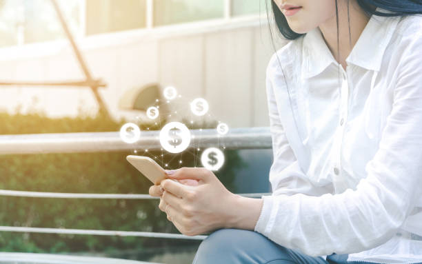 Asian woman hand using mobile phone with online transaction application, Concept financial technology (fintech) Asian woman hand using mobile phone with online transaction application, Concept financial technology (fintech) smart phone technology lifestyles chain stock pictures, royalty-free photos & images