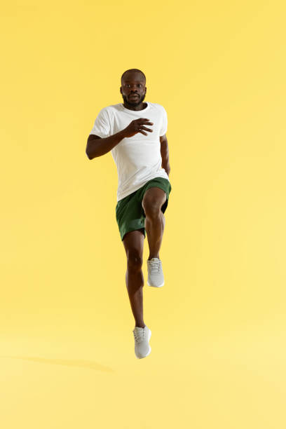 istock Workout. Sports man exercising, running on spot, cardio training 1163725986