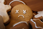 Sad gingerbread man in the woven basket