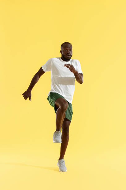 istock Workout. Sports man exercising, running on spot, cardio training 1163726112