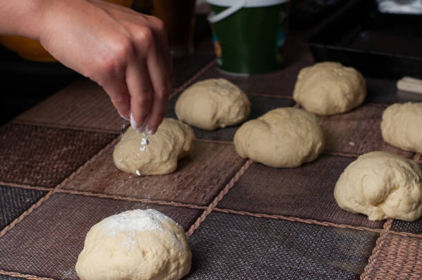 istock Woman making dought.Dought for pizza and bread.Food. 1163726476