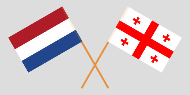 Georgia and Netherlands. Crossed Georgian and Netherlandish flags Georgia and Netherlands. Crossed Georgian and Netherlandish flags. Official colors. Correct proportion. Vector illustration georgia football stock illustrations