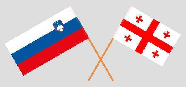 Georgia and Slovenia. Crossed Georgian and Slovenian flags Georgia and Slovenia. Crossed Georgian and Slovenian flags. Official colors. Correct proportion. Vector illustration georgia football stock illustrations