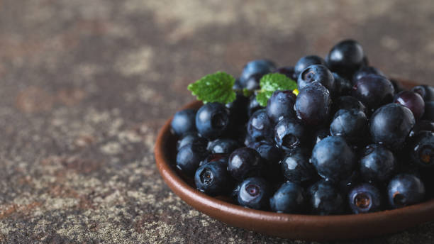 istock Fresh ripe blueberries closeup 1163727995