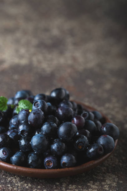 istock Fresh ripe blueberries closeup 1163728127