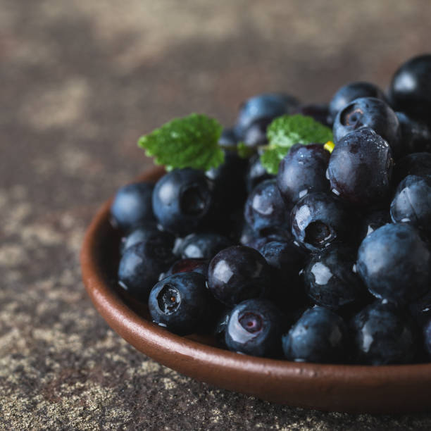istock Fresh ripe blueberries closeup 1163728218