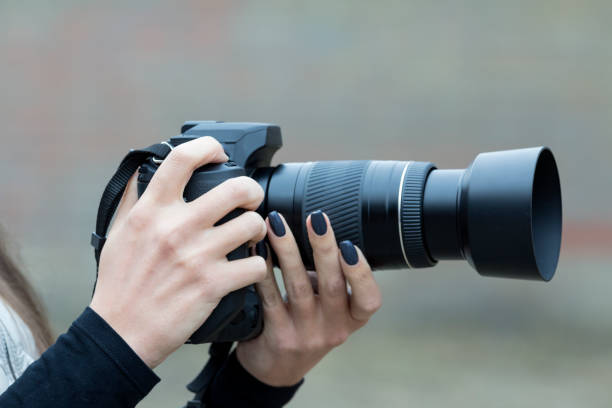 istock camera in the hands of girls 1163729076