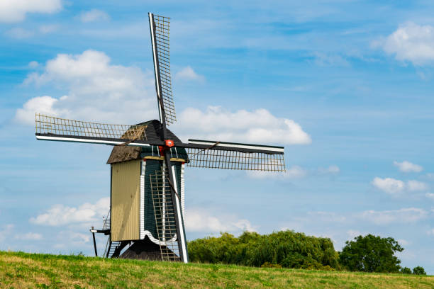 istock Postmill along dike. Batenburg, The Netherlands. Space for text 1163730759