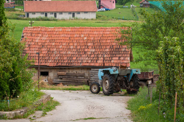 Tractor and house on the mountain