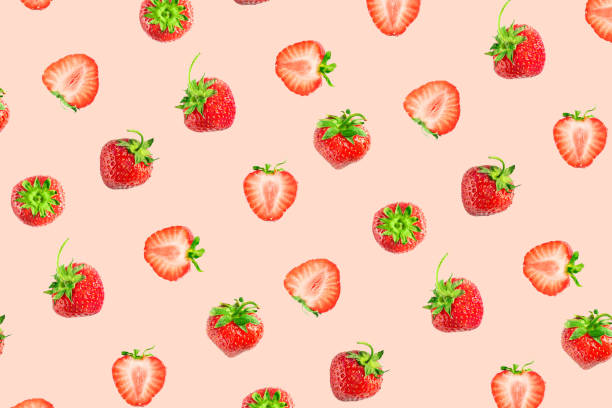 istock Colorful pattern of strawberries on pink pastel background 1163733702