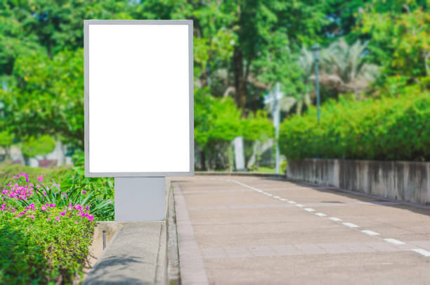 istock led blank billboard white screen side road in city. ad mockup copy space for advertising banner near bus stop in metropolis. 1163735232