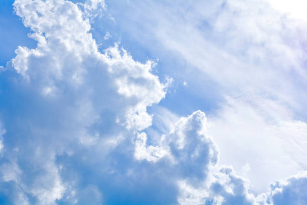 istock Blue sky background and fluffy white cloud in sunny day 1163736525