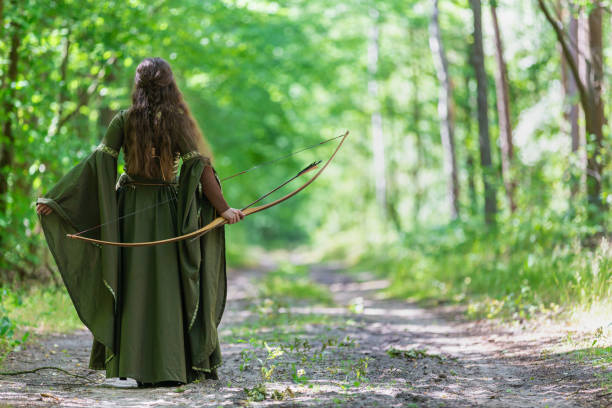 istock Elf archer from behind in the woods 1163737132