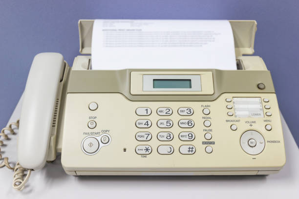 istock The fax machine for Sending documents in the office concept equipment needed in office 1163737234