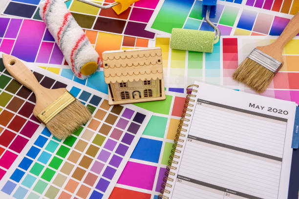 istock Color palettes with brush and roller close up 1163739446
