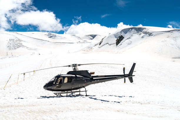 istock Helicopter on snowy landscape 1163742267