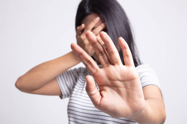 istock Young Asian woman hide her  face. 1163744381