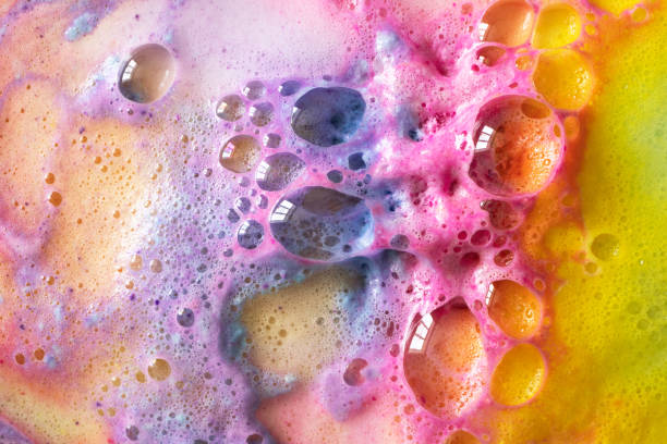 Macro rainbow bubbles of bath bombs texture stock photo