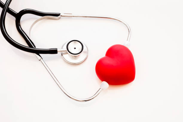 istock Red heart and a stethoscope on white background 1163746992
