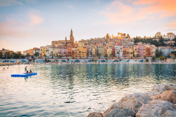 istock Public beach of Menton old town at sunset 1163747152