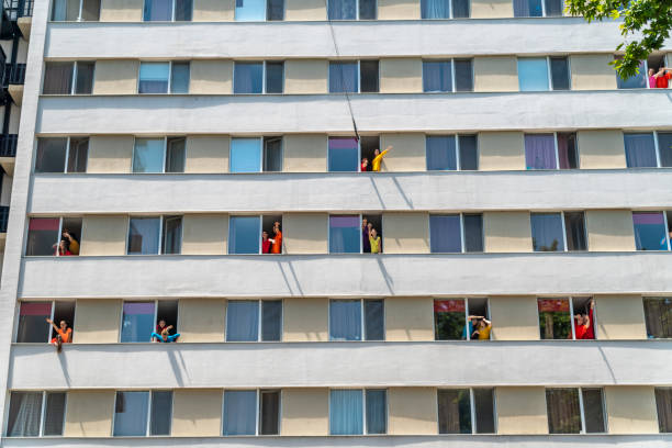 PLOVDIV, BULGARIA - JUNE 16, 2019 - Artists performing a dance show inside a building and on fire escape ladder in Plovdiv city in Bulgaria