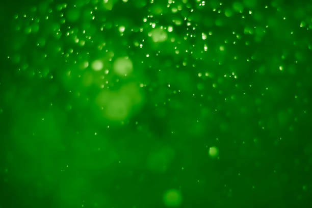 istock Green ufo bokeh background abstract - pictures 1163754868