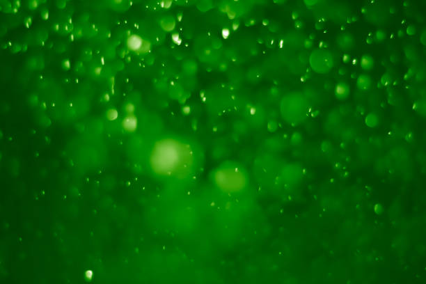 istock Green ufo bokeh background abstract - pictures 1163755040