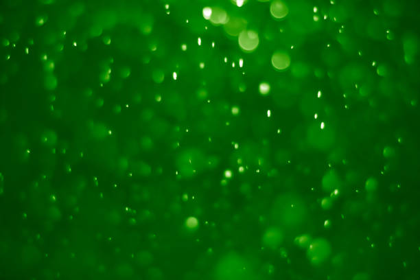 istock Green ufo bokeh background abstract - pictures 1163755054