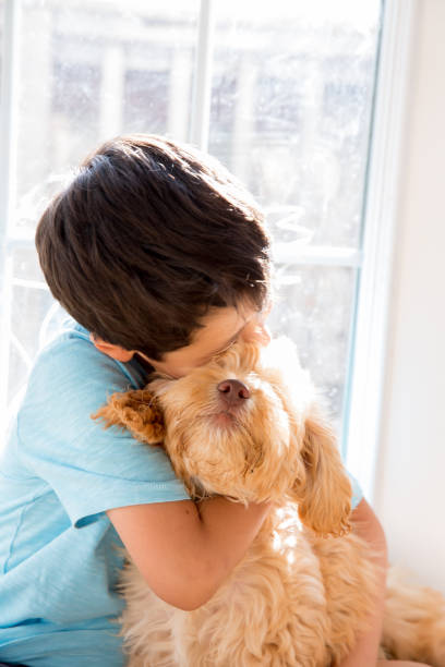 istock Puppy and a little Boy 1163760884