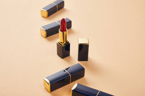 istock close up of various lipstick in tubes on beige 1163765698