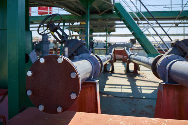 istock Pipeline for loading liquid cargo on an oil tanker 1163766212