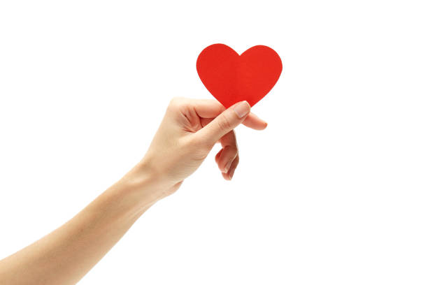 istock Woman Holding Heart Shape Over White Background 1163768343