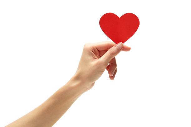 istock Woman Holding Heart Shape Over White Background 1163768345