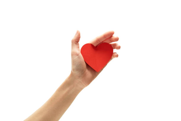 istock Woman Holding Heart Shape Over White Background 1163768349