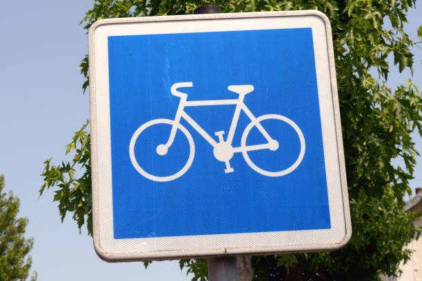 istock sign indicating the start of a bike path 1163770230