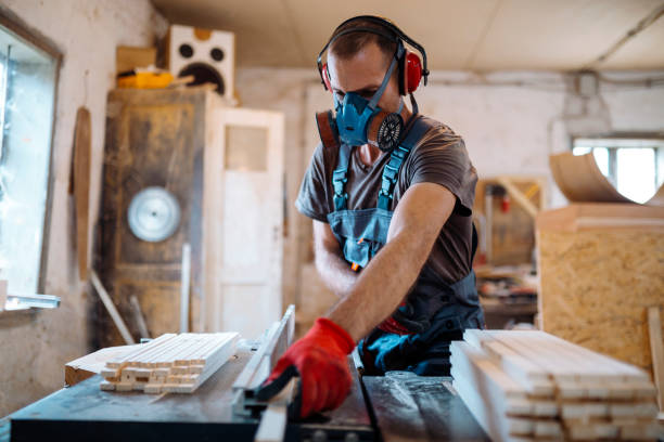istock Male carpenter working at his workshop stock photo 1163770233