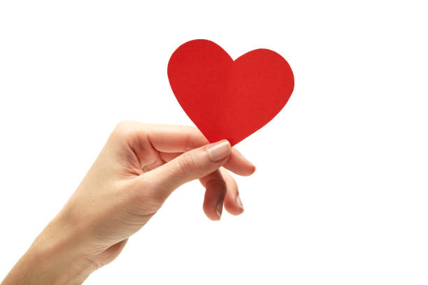 istock Woman Holding Heart Shape Over White Background 1163770246