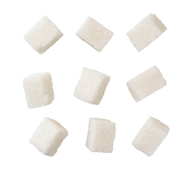 Set of refined sugar cubes on a white, isolated. The view of the top. Set of refined sugar cubes on a white background, isolated. The view of the top. sugar cube stock pictures, royalty-free photos & images