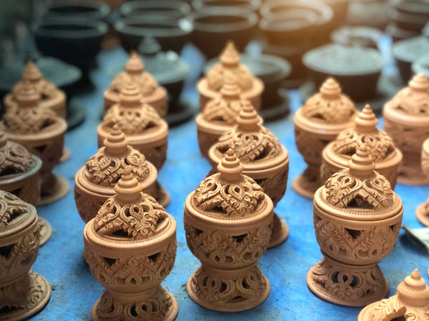 istock Handmade glazed pottery and carved in Thai art style 1163772292
